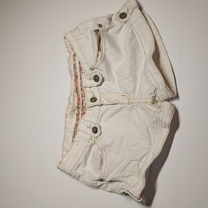 Lucy Luxury Jean shorts with inner floral design size Small.